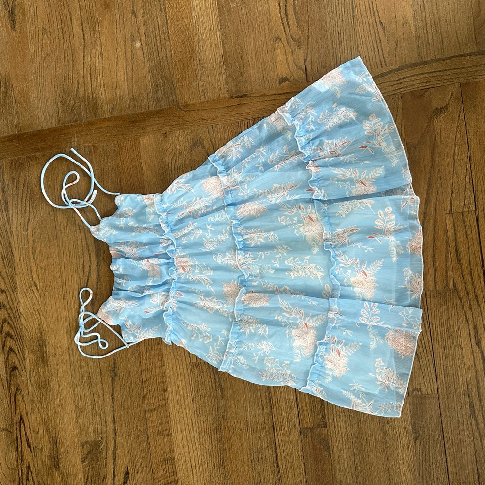 Light blue dress with orange and white details
